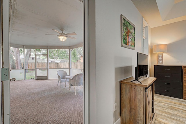 interior space featuring light colored carpet