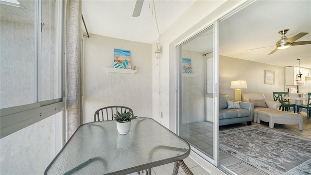 dining room featuring ceiling fan