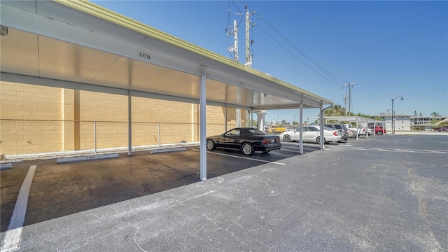 view of car parking with a carport