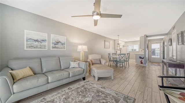 living room with ceiling fan