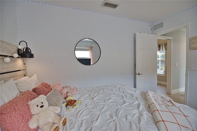 bedroom featuring light hardwood / wood-style flooring