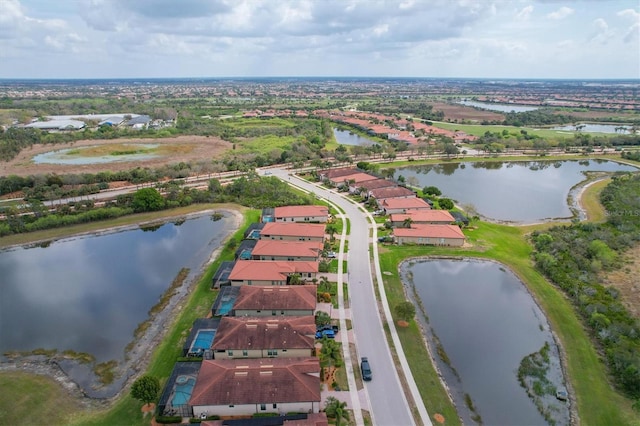 bird's eye view with a water view