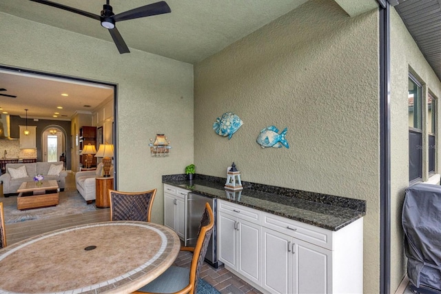 dining room with ceiling fan