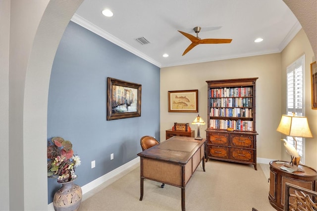 home office featuring ornamental molding, ceiling fan, and light colored carpet