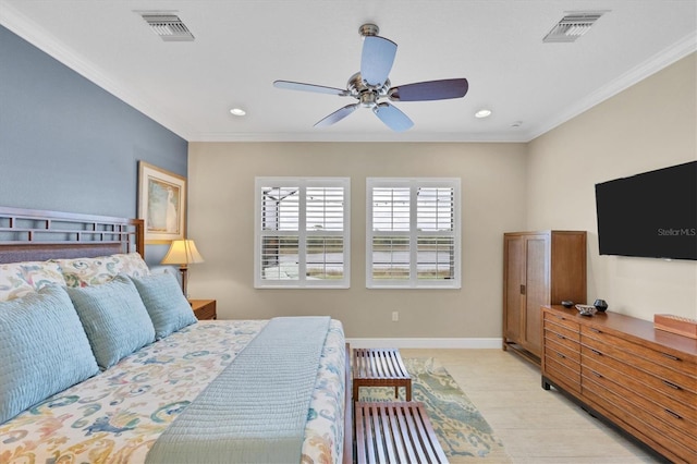 bedroom with ornamental molding and ceiling fan