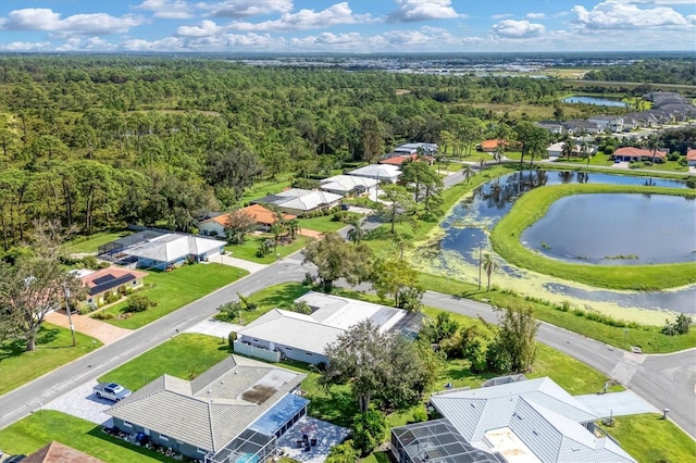 drone / aerial view with a water view