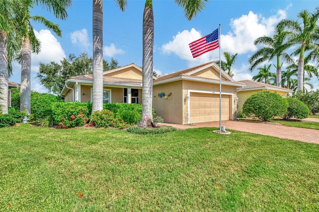 ranch-style home with a garage and a front yard