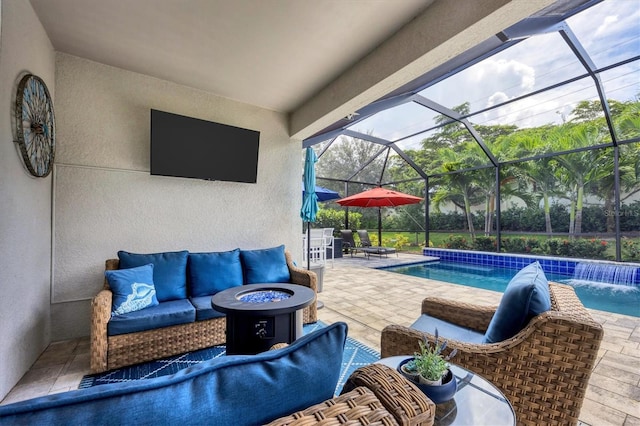 view of patio / terrace with pool water feature, an outdoor living space, and a lanai