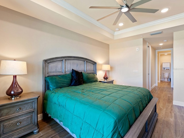 bedroom featuring ceiling fan, dark wood-type flooring, and crown molding