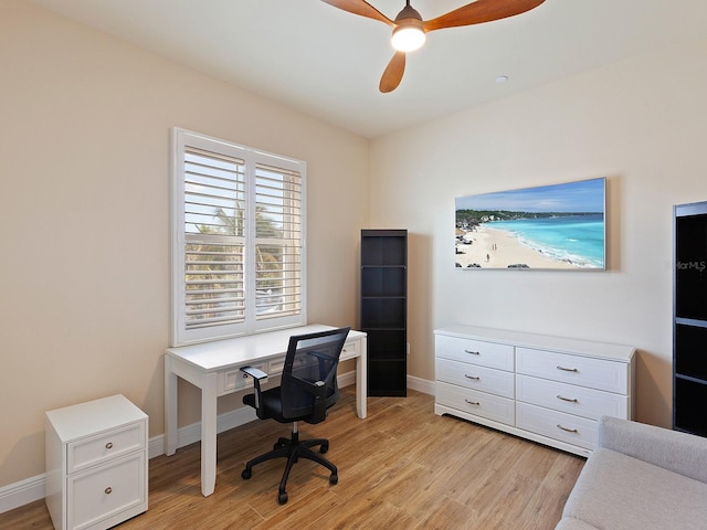 home office with ceiling fan and light wood-type flooring