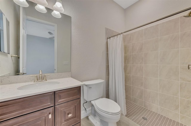 bathroom featuring vanity, tile patterned floors, toilet, and a shower with shower curtain