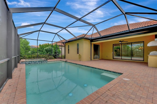 view of swimming pool featuring a lanai, a patio, and ceiling fan