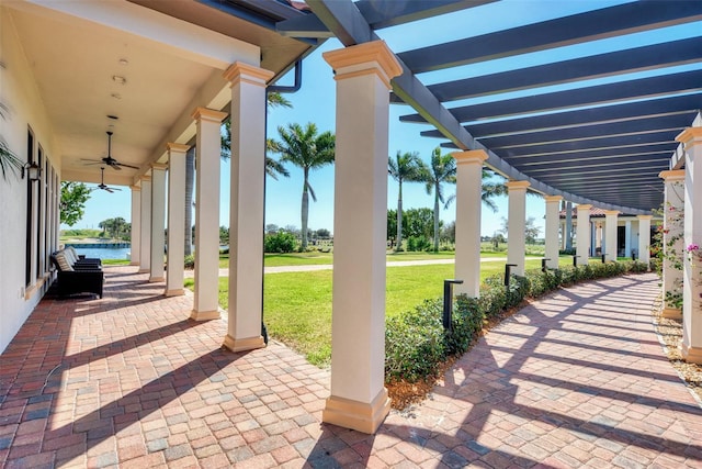 view of patio featuring a pergola and ceiling fan