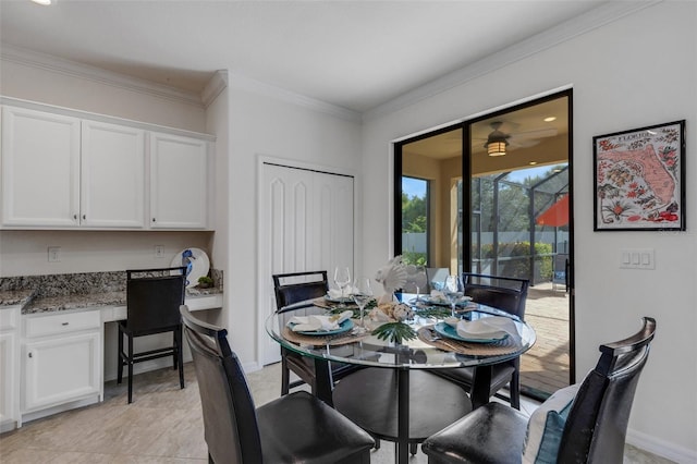 dining room featuring ornamental molding