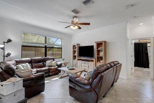 tiled living room featuring ceiling fan and crown molding