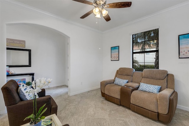 living room featuring ornamental molding, ceiling fan, and light tile patterned floors