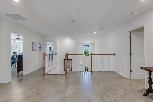 spare room with ceiling fan