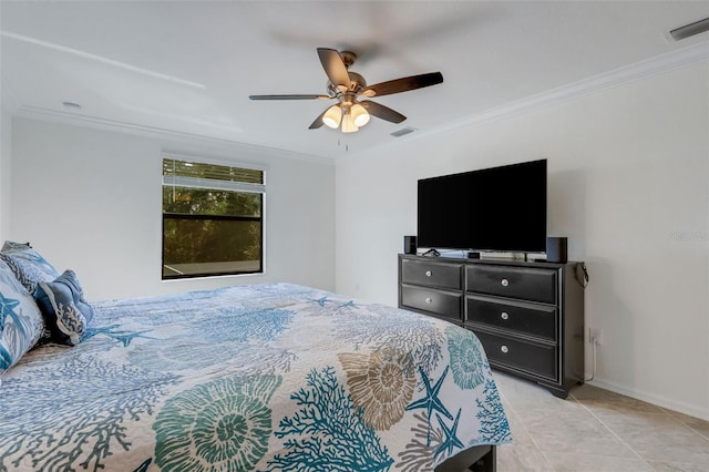 tiled bedroom with ornamental molding and ceiling fan