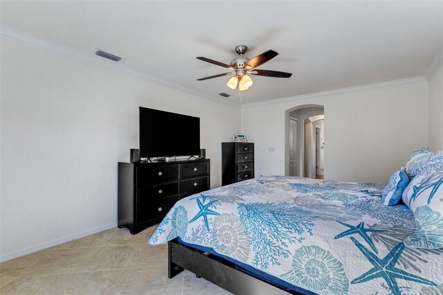 bedroom with ceiling fan, light tile patterned flooring, and crown molding