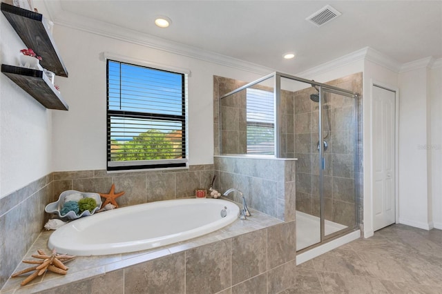 bathroom featuring independent shower and bath and ornamental molding