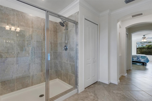 bathroom featuring walk in shower, tile patterned flooring, ornamental molding, and ceiling fan