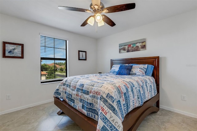 bedroom with ceiling fan and light tile patterned floors