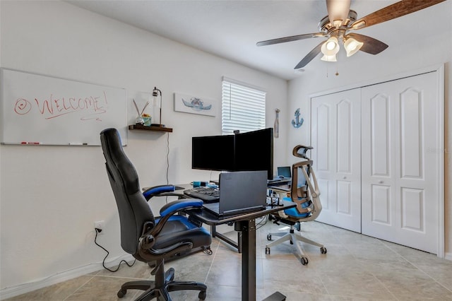 office area featuring ceiling fan and light tile patterned floors