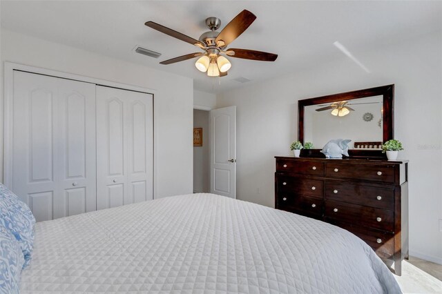 bedroom with a closet and ceiling fan