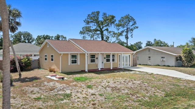 single story home featuring french doors