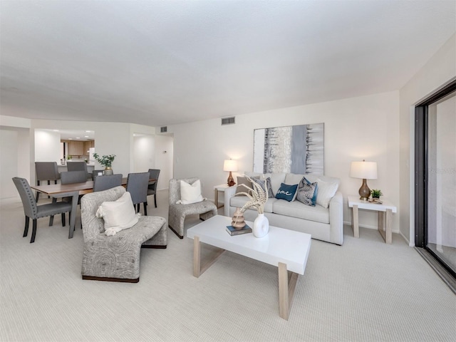 5050 Marianne Key Rd Unit 3B, Punta Gorda, FL 33955 - living area featuring visible vents and light colored carpet