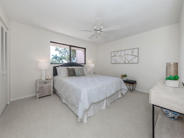 5050 Marianne Key Rd Unit 3B, Punta Gorda, FL 33955 - carpeted bedroom with a closet, a ceiling fan, and baseboards
