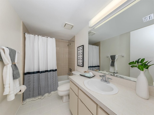 full bathroom with shower / bath combination with curtain, vanity, tile patterned flooring, and toilet