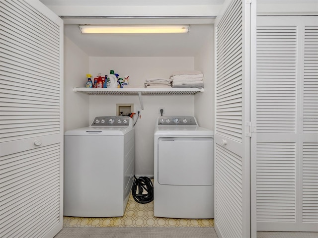 5050 Marianne Key Rd Unit 3B, Punta Gorda, FL 33955 - washroom with washing machine and clothes dryer and laundry area