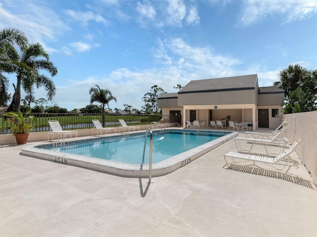 view of swimming pool featuring a patio