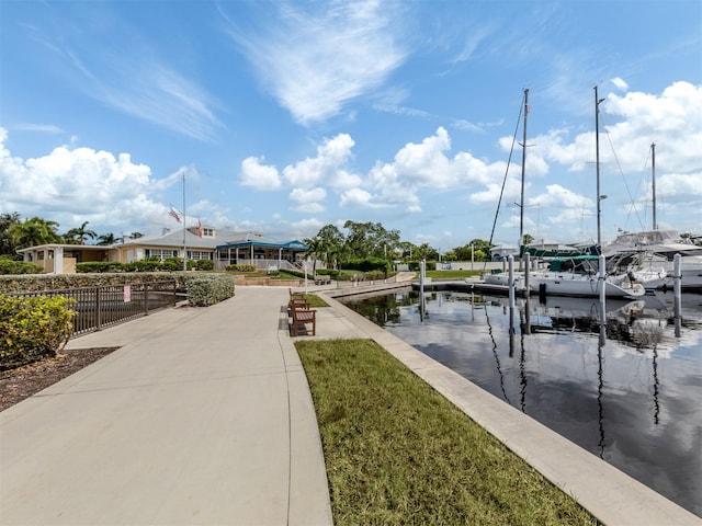 dock area with a water view