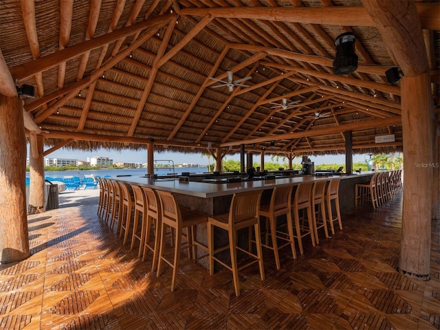 5050 Marianne Key Rd Unit 3B, Punta Gorda, FL 33955 - view of patio / terrace featuring outdoor wet bar and a water view