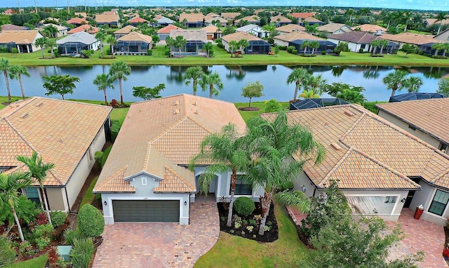 bird's eye view with a water view