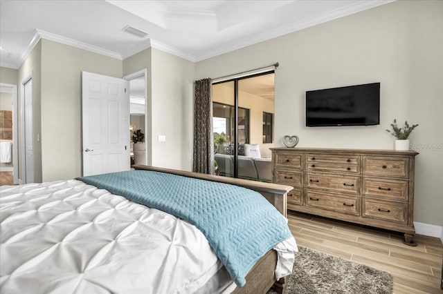 bedroom featuring light hardwood / wood-style flooring and ornamental molding