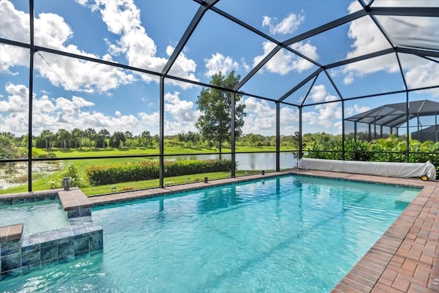 view of pool with pool water feature, a water view, and glass enclosure