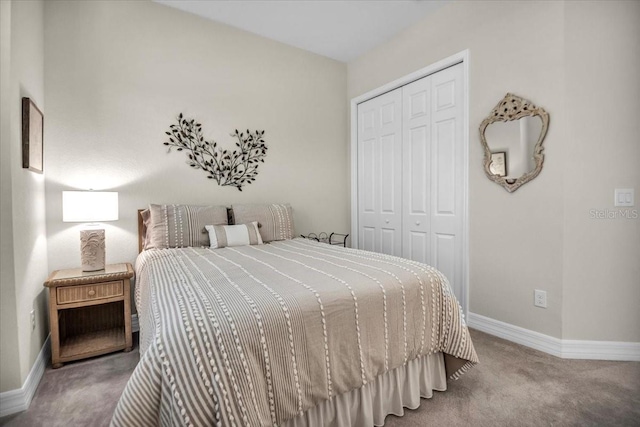 carpeted bedroom with a closet