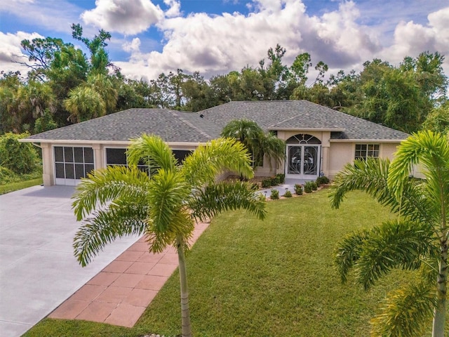 ranch-style home with a front lawn