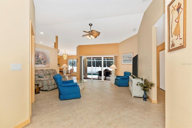 living room with lofted ceiling and ceiling fan