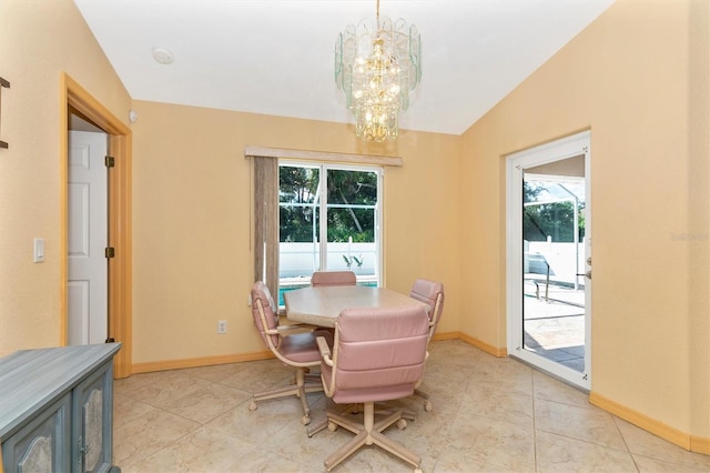 tiled dining room featuring an inviting chandelier, lofted ceiling, and plenty of natural light