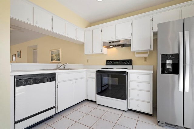 kitchen featuring light tile patterned flooring, sink, white appliances, and white cabinetry