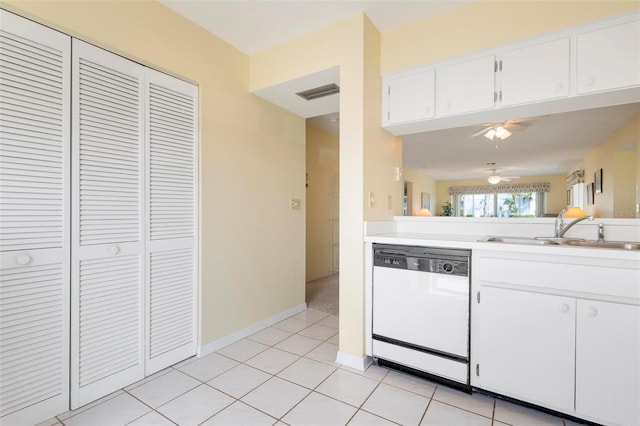 kitchen featuring dishwasher, sink, white cabinets, light tile patterned floors, and ceiling fan