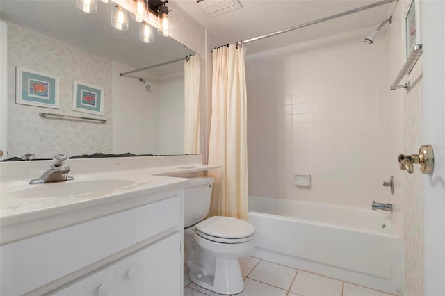 full bathroom featuring shower / bath combo, vanity, toilet, and tile patterned floors