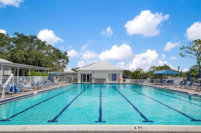 view of swimming pool with a patio