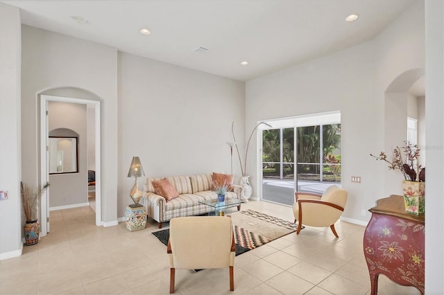 living room with light tile patterned flooring