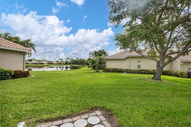 view of yard with a water view