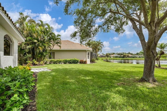 view of yard with a water view